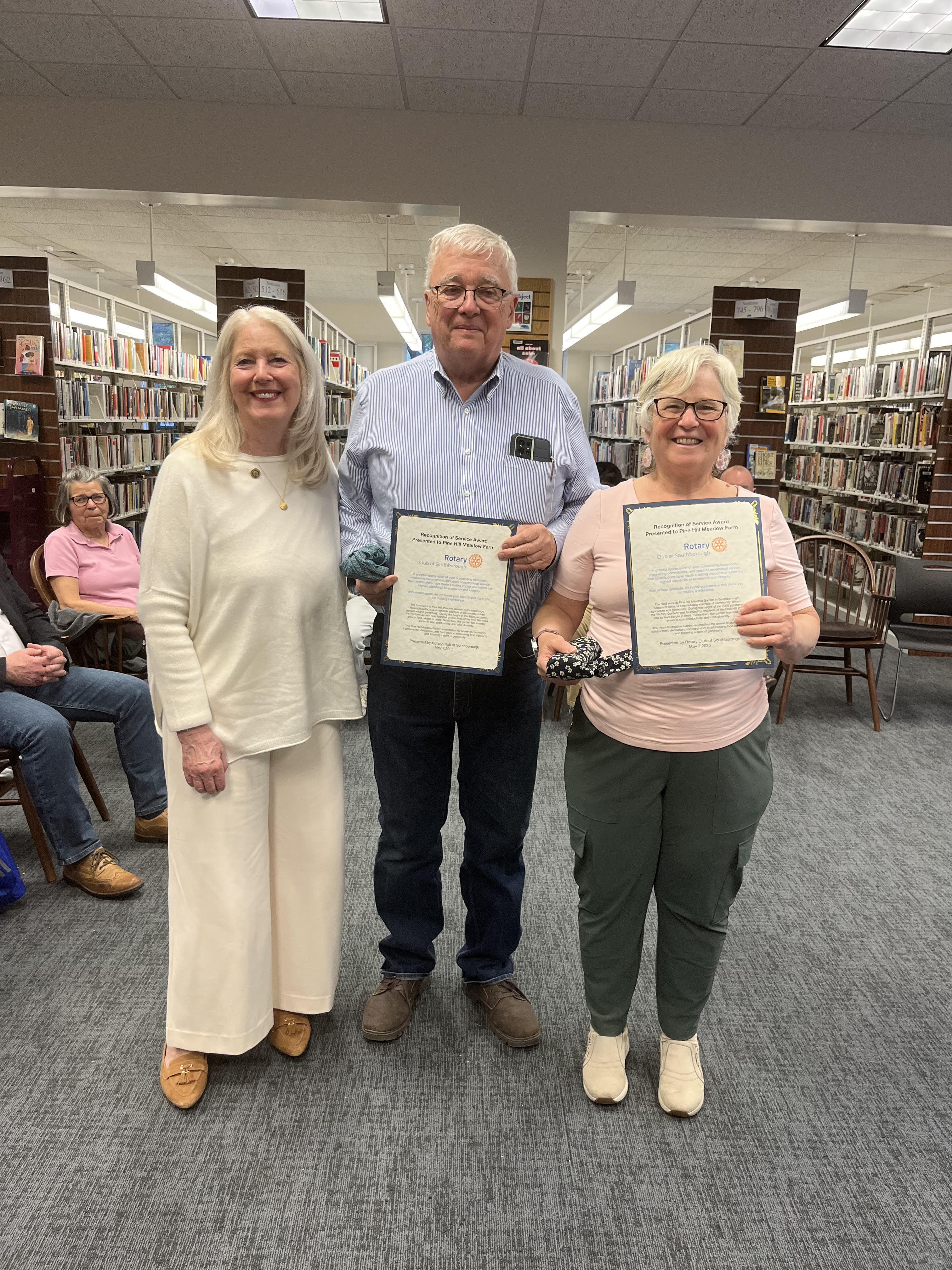 Al & Diana receiving an award